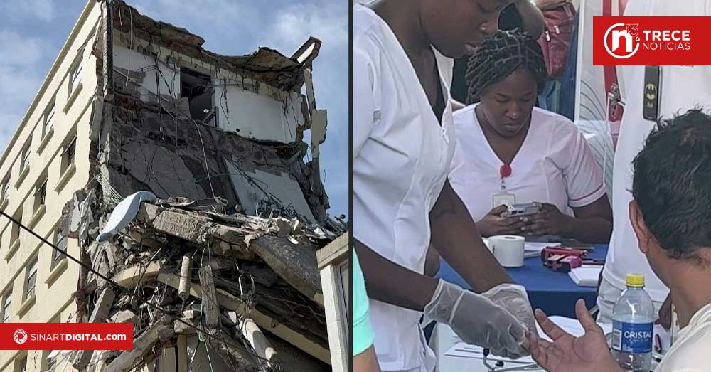 Socorristas de Colombia rescatan a una mujer bajo los escombros de un potente terremoto