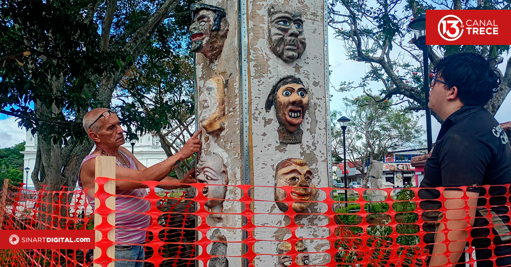 Restauran tótem de mascaradas en el parque de Barva